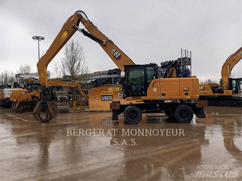 CAT MH3024-1 Колісні екскаватори