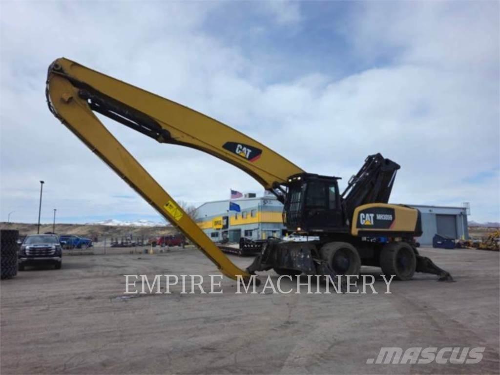 CAT MH3059 Гусеничні екскаватори