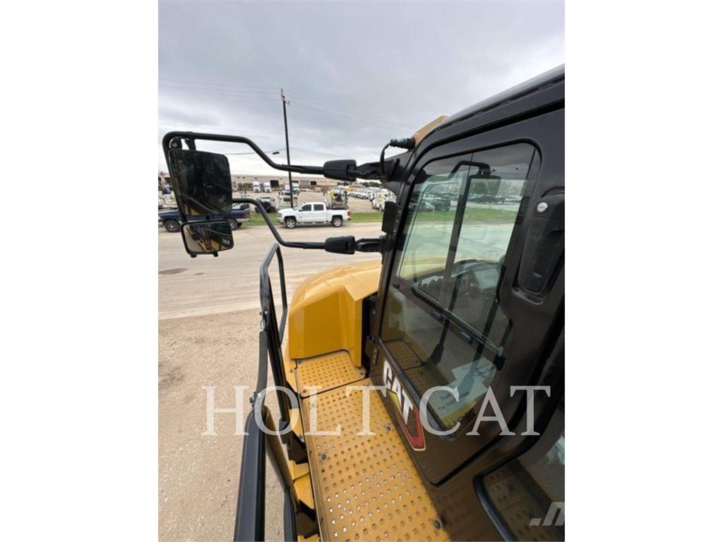 CAT W00 730 Зчленовані самоскиди