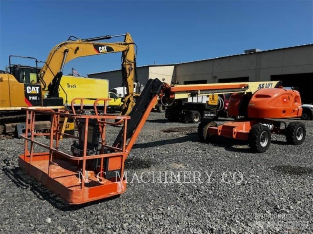 JLG 460SJ Гусеничні екскаватори