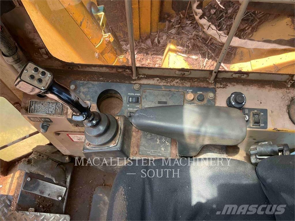 John Deere 653E Валочно-пакетувальні машини