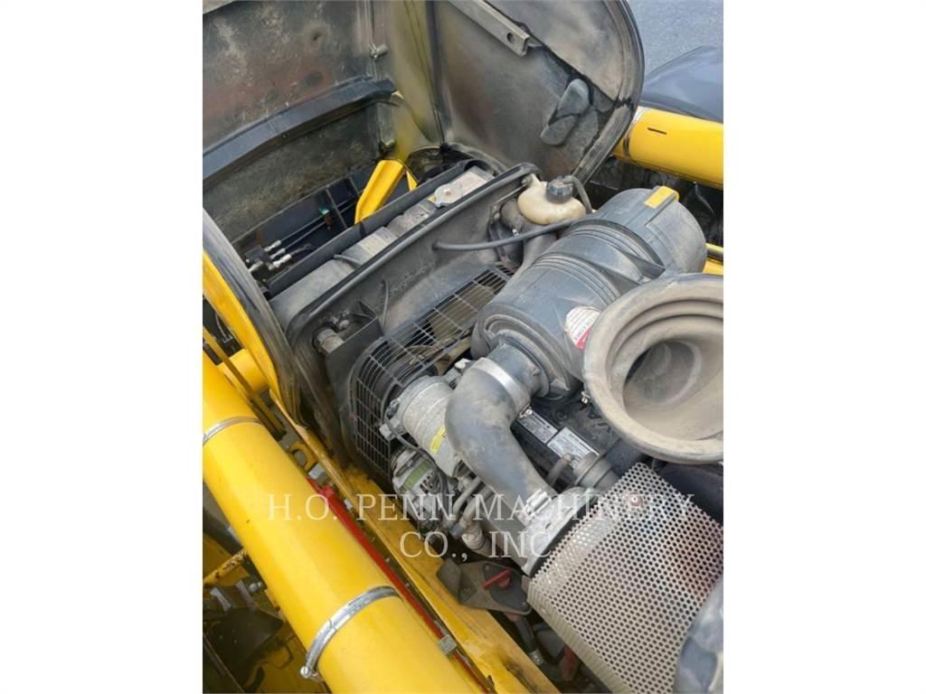 Komatsu WB150 Екскаватори-навантажувачі