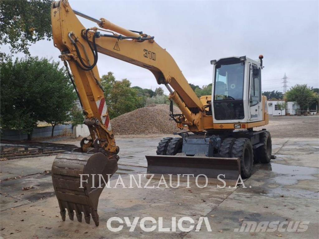 Liebherr A310B Колісні екскаватори