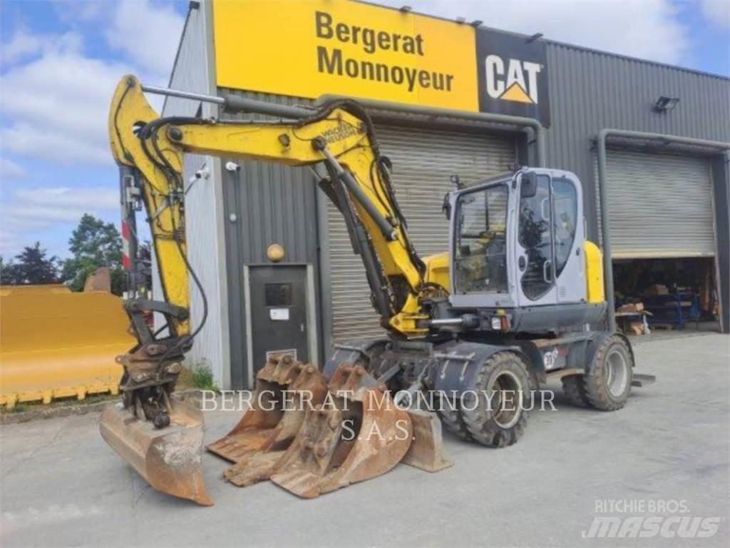 Neuson EW100 Колісні екскаватори