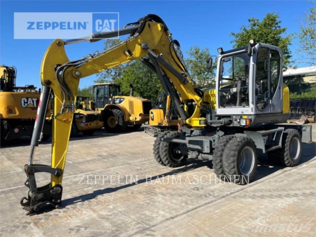 Neuson EW100 Колісні екскаватори