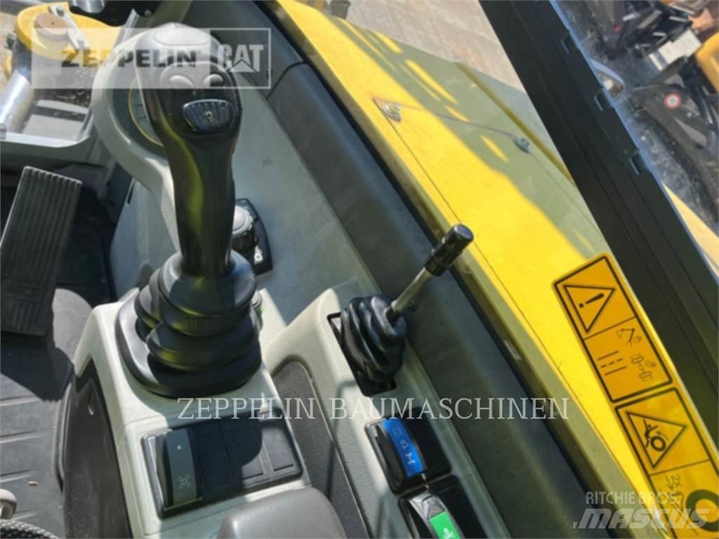 Neuson EW100 Колісні екскаватори