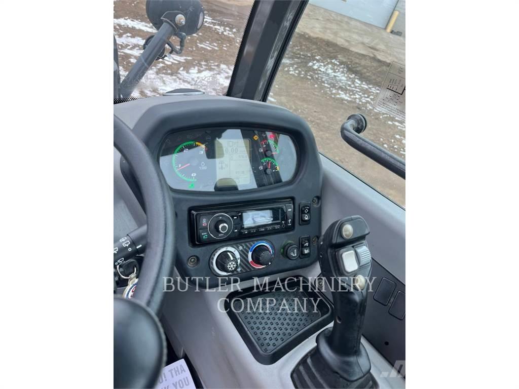 New Holland 321F Фронтальні навантажувачі
