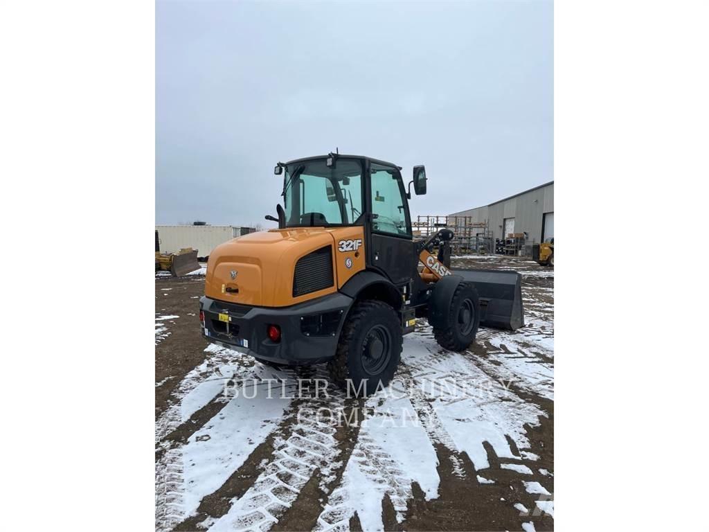 New Holland 321F Фронтальні навантажувачі