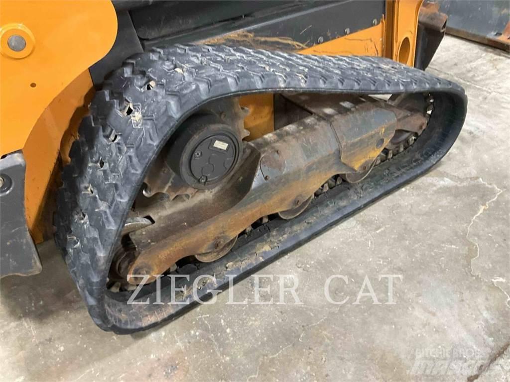 New Holland TR310B Гусеничні вантажники