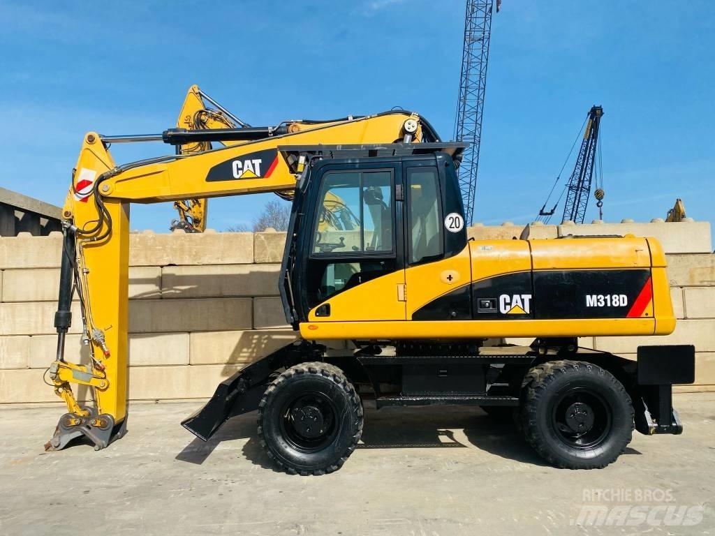 CAT M 318 D Колісні екскаватори