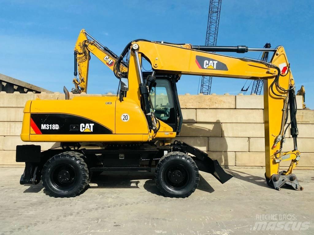 CAT M 318 D Колісні екскаватори