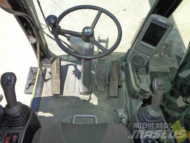 CAT M 318 D Колісні екскаватори