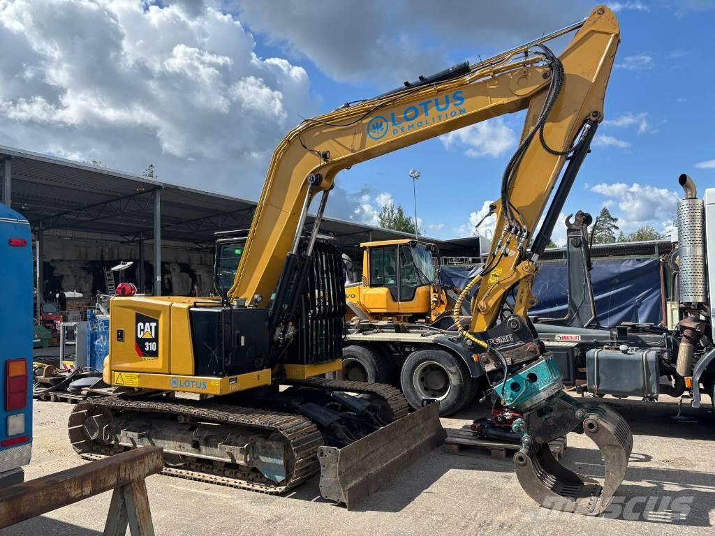 CAT 310 Гусеничні екскаватори