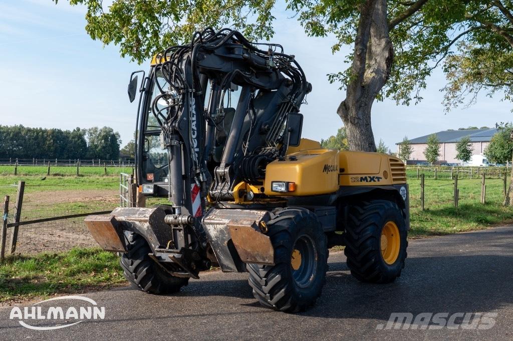 Mecalac 12 MXT Колісні екскаватори