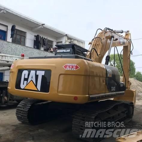 CAT 324 Гусеничні екскаватори