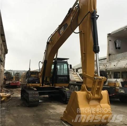 CAT 324 Гусеничні екскаватори