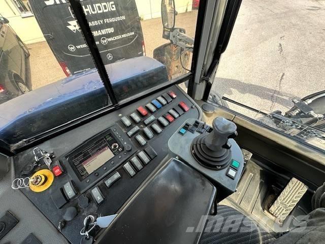 Huddig 1260B City Екскаватори-навантажувачі