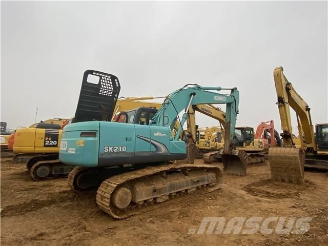 Kobelco SK 210 Гусеничні екскаватори