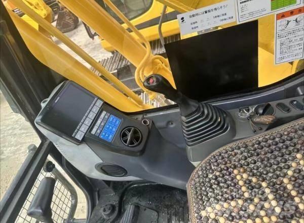 Komatsu PC 200 Середні екскаватори 7т. - 12т.