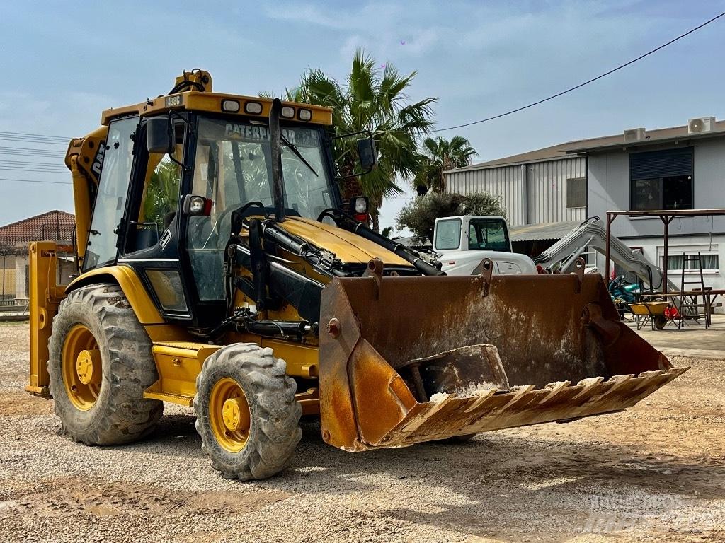 CAT 438 C Екскаватори-навантажувачі