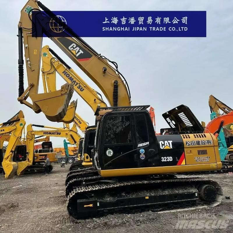 CAT 323 D Гусеничні екскаватори