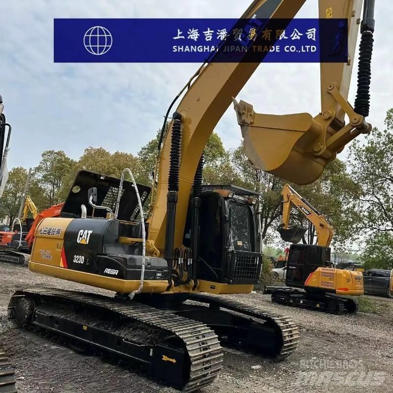 CAT 323 D Гусеничні екскаватори