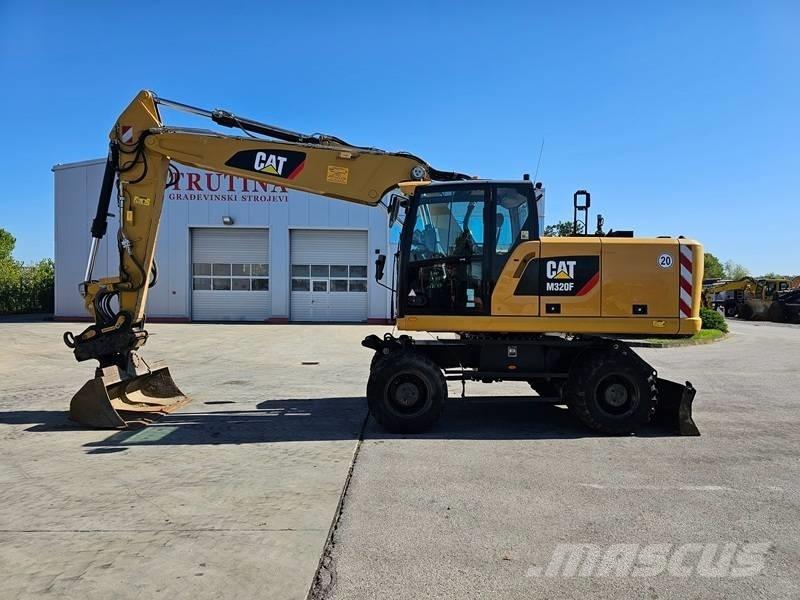 CAT M 320F Колісні екскаватори