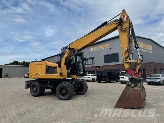 CAT M 318 F Колісні екскаватори
