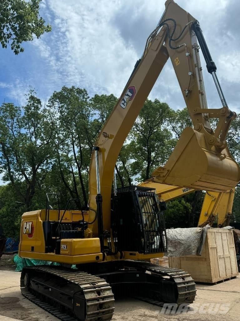 CAT 323 Середні екскаватори 7т. - 12т.