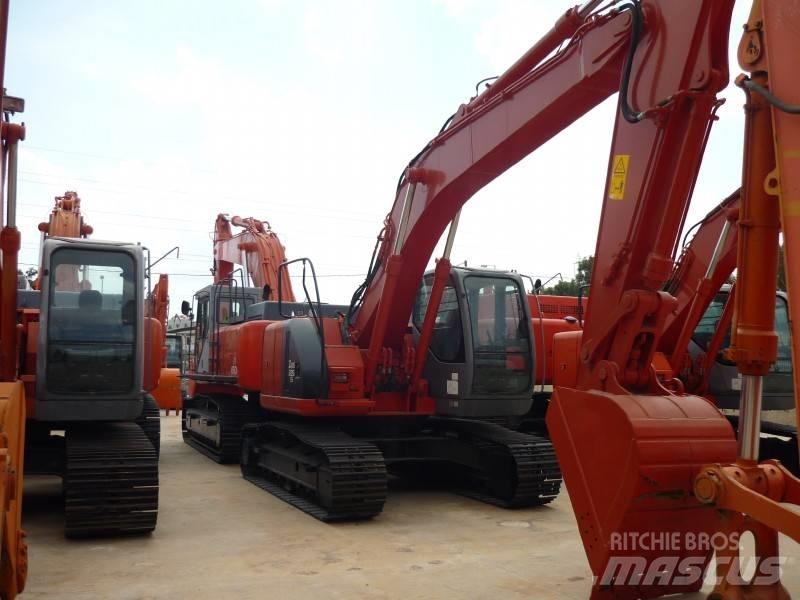 Hitachi ZX 225 US Гусеничні екскаватори