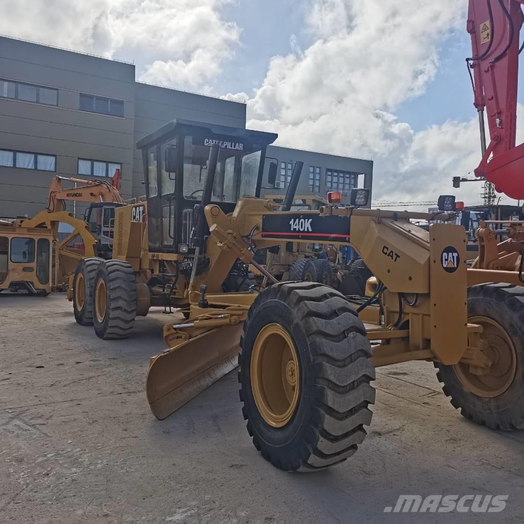 CAT 140k Грейдери