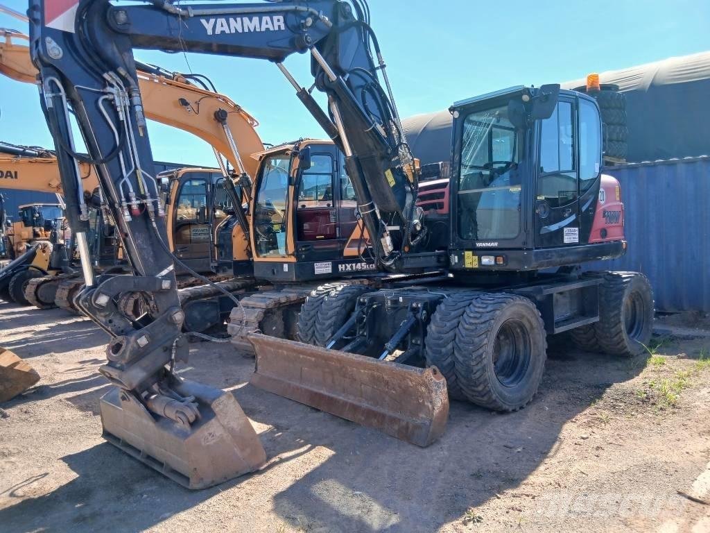 Yanmar B 110 W Колісні екскаватори