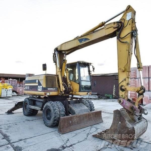 CAT M 315 Колісні екскаватори