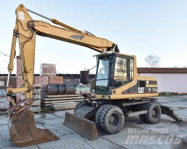 CAT M 315 Колісні екскаватори