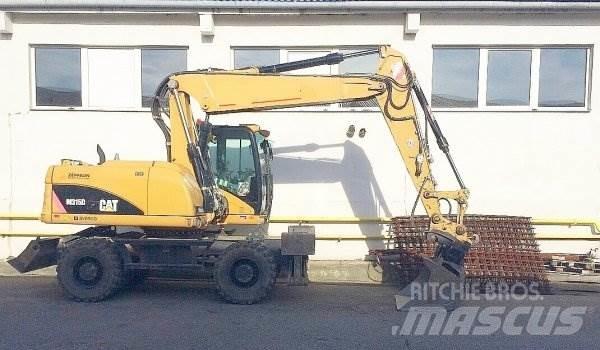 CAT M 315 D Колісні екскаватори