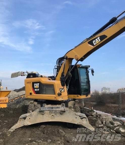 CAT M317 F Колісні екскаватори