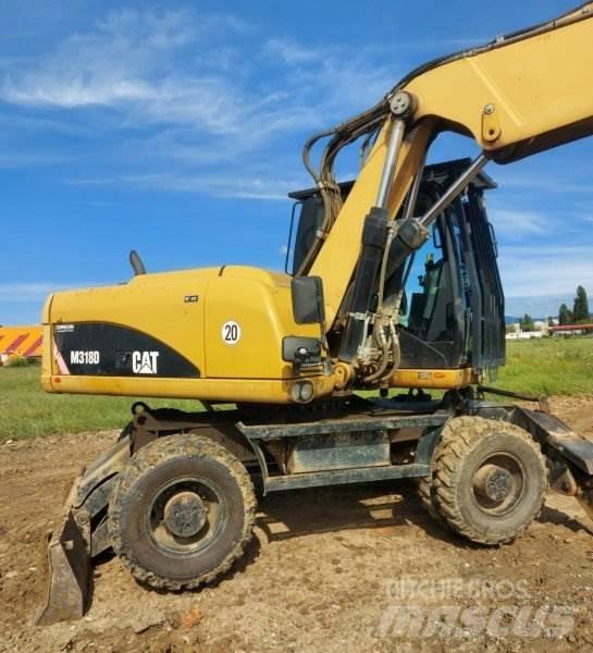 CAT M318 D Колісні екскаватори