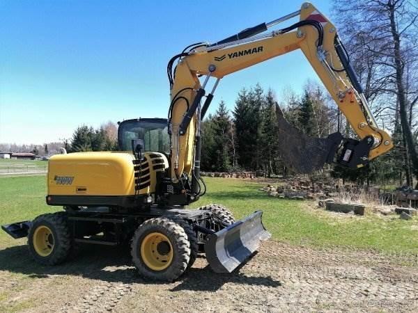 Yanmar B110 W Style Колісні екскаватори