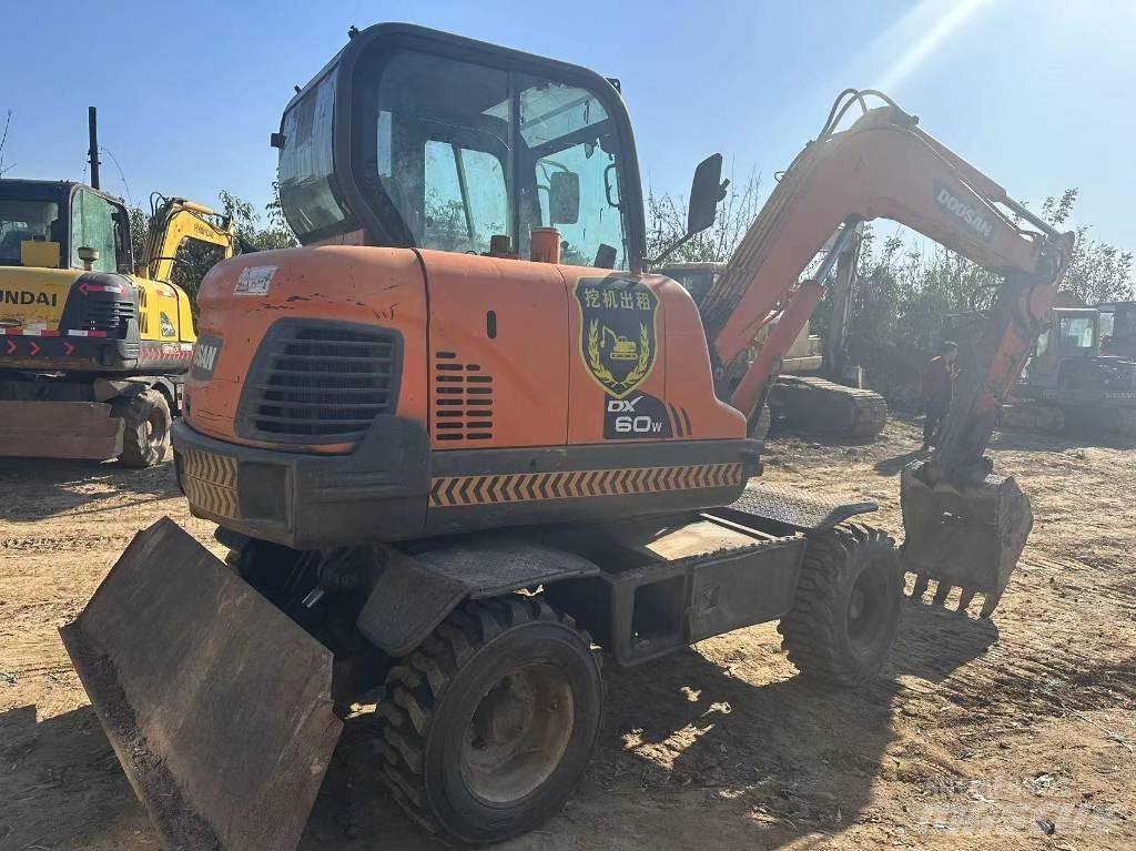 Doosan DX60W Міні-екскаватори < 7т