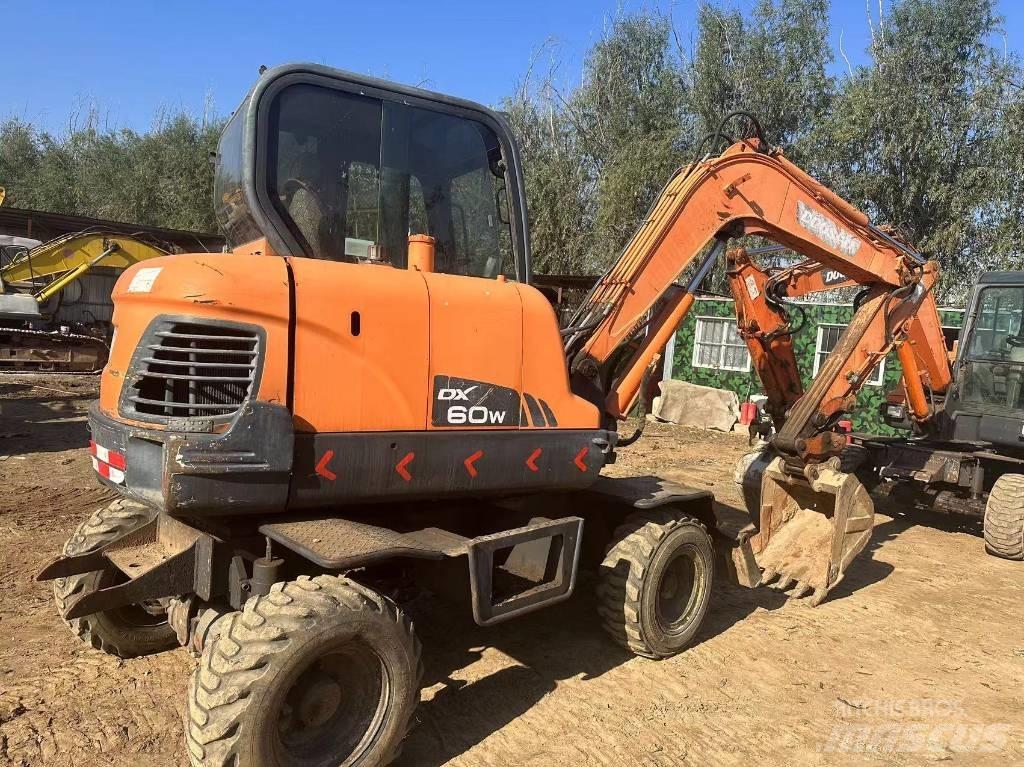 Doosan DX60W Міні-екскаватори < 7т
