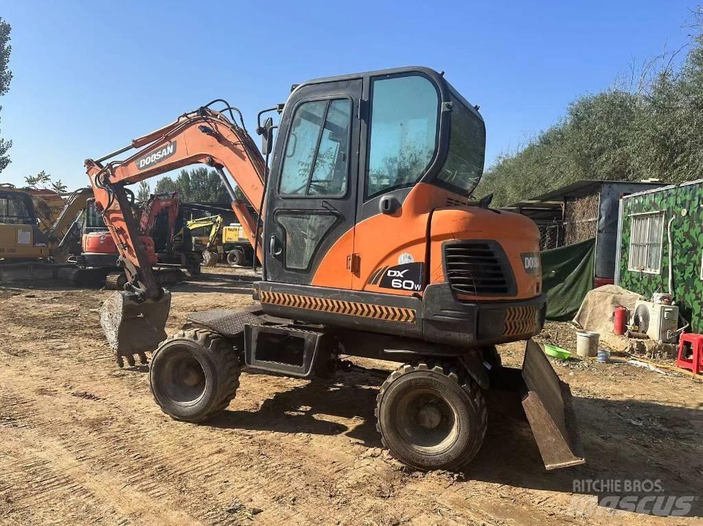 Doosan DX60W Міні-екскаватори < 7т