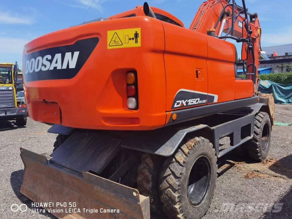 Doosan DX150W-9C Колісні екскаватори