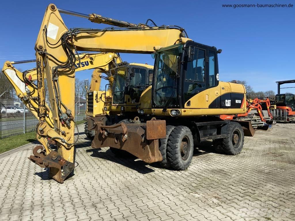 CAT M 315 D Колісні екскаватори