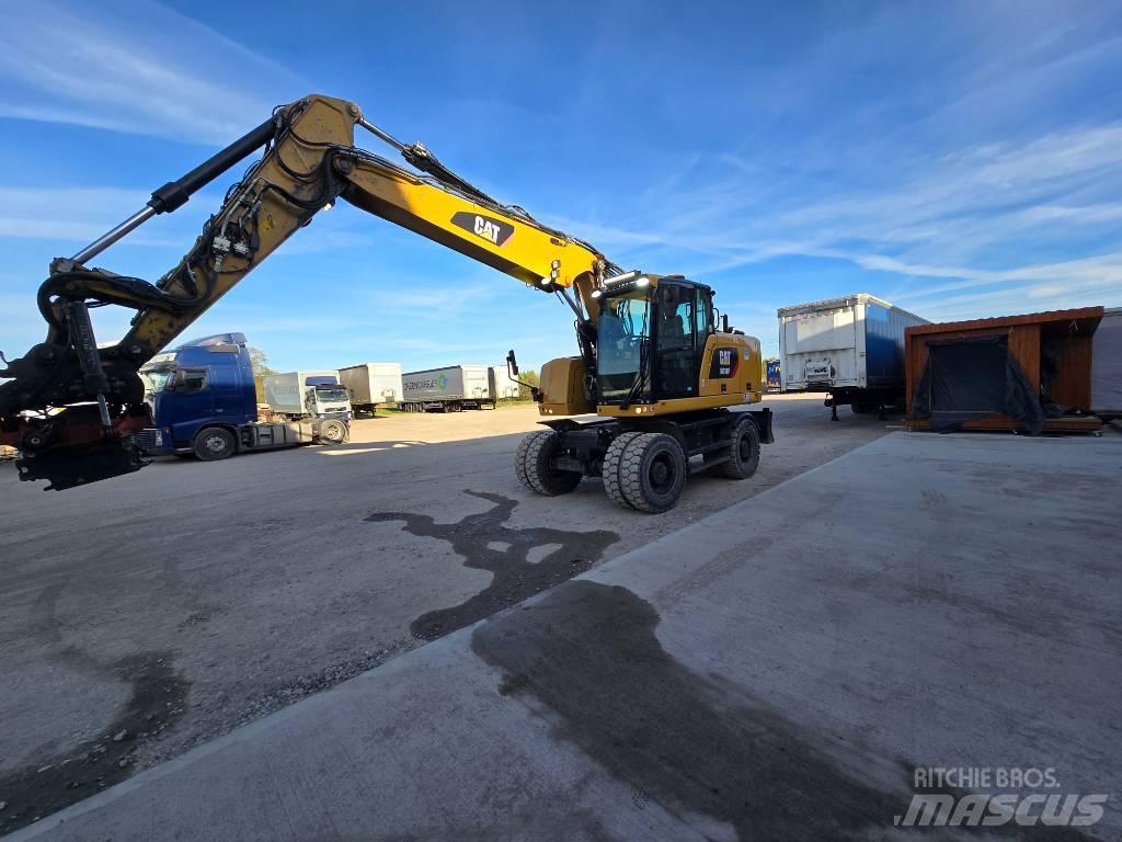 CAT 318 Колісні екскаватори