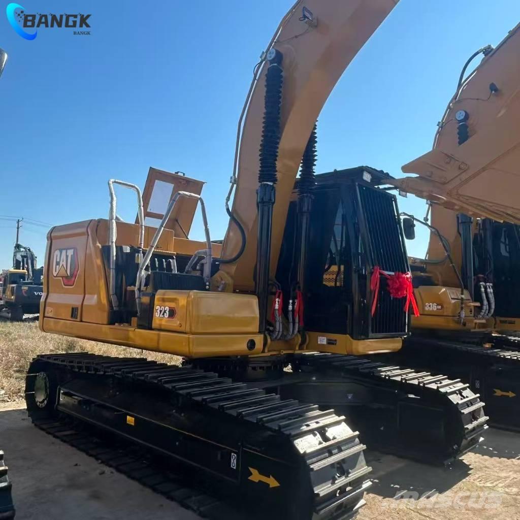 CAT 323 Гусеничні екскаватори