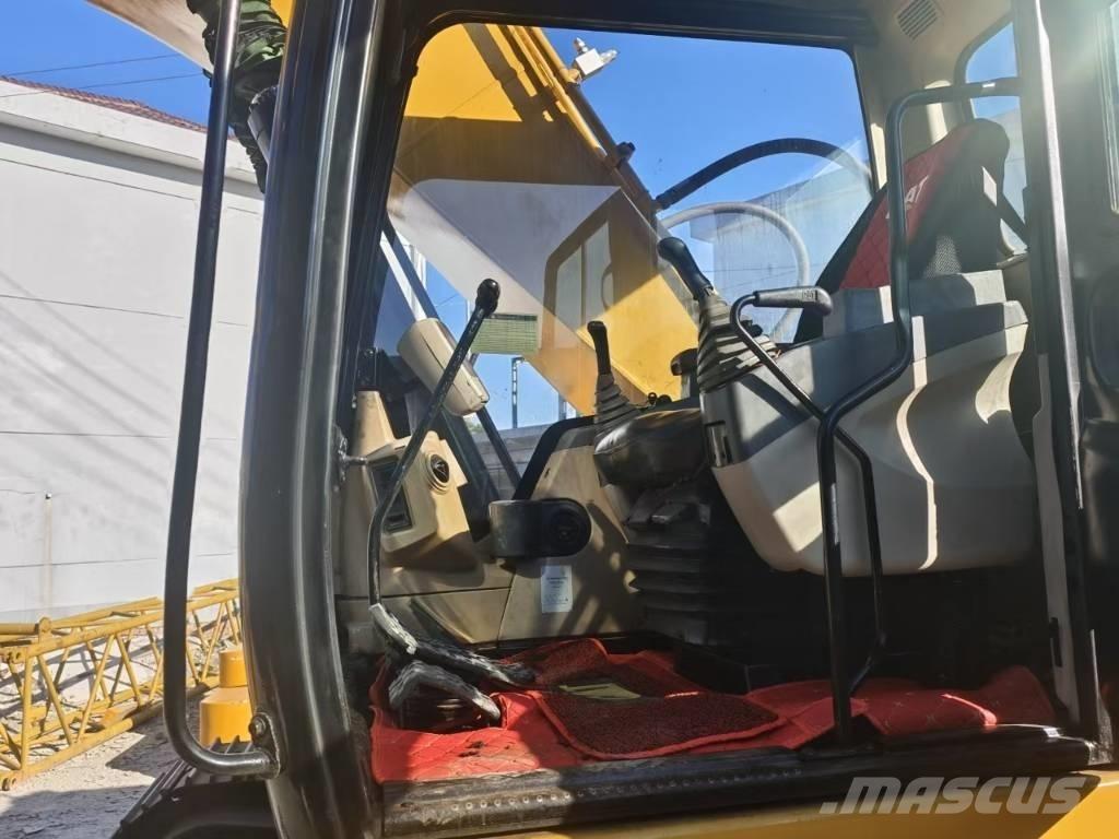 CAT 320 Гусеничні екскаватори