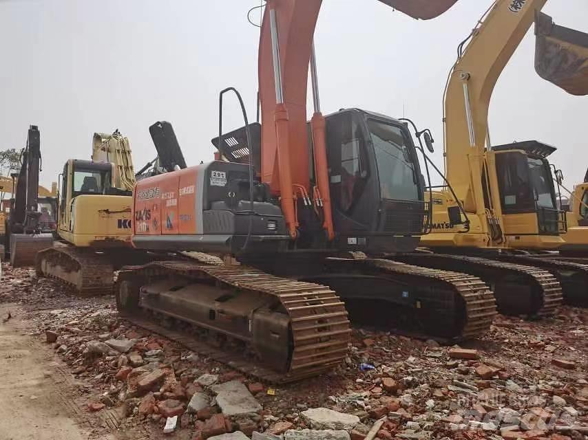 Hitachi ZX 210 Гусеничні екскаватори