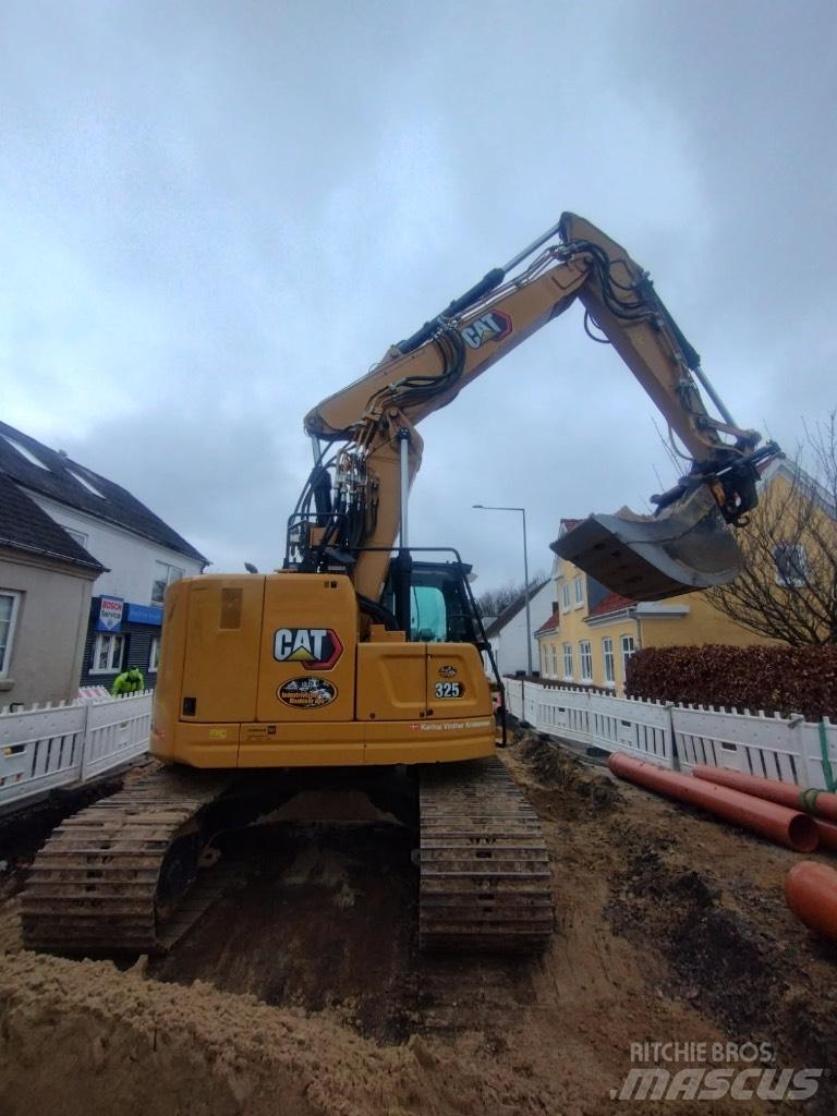 CAT 325 Гусеничні екскаватори
