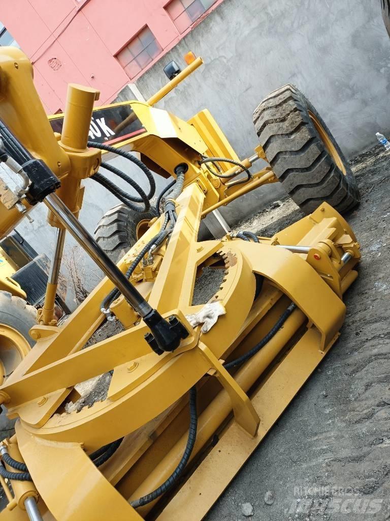 CAT 140K Грейдери