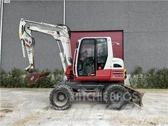 Takeuchi TB295W Колісні екскаватори